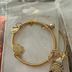 Set of 4 Gold Charm Bracelets with Fish and Heart Accents. Gold & Silver Tones.
